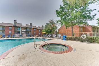Swimming pool with hot tub